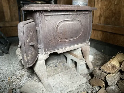 Cold Wood Stove With Lots Of Ashes 